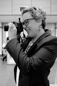 Bonnie taking a photo with camera to eye