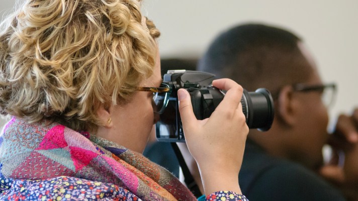 Bonnie Shea with camera taking picture